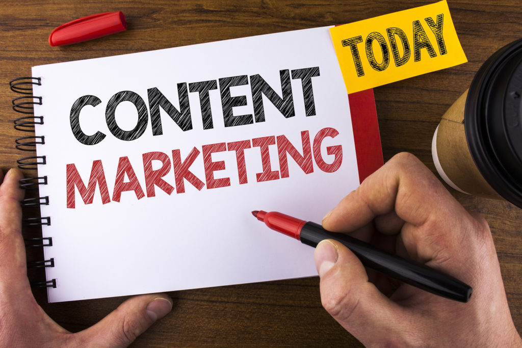 Conceptual hand writing showing Content Marketing.