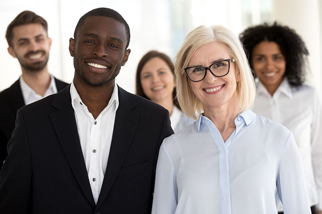 Diverse older and young professionals